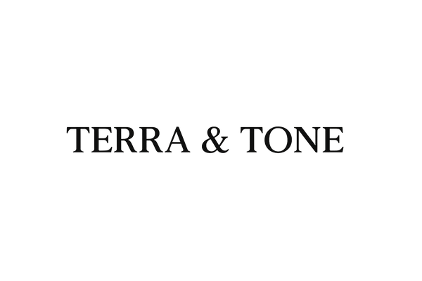 Black text 'TERRA & TONE' on a white background